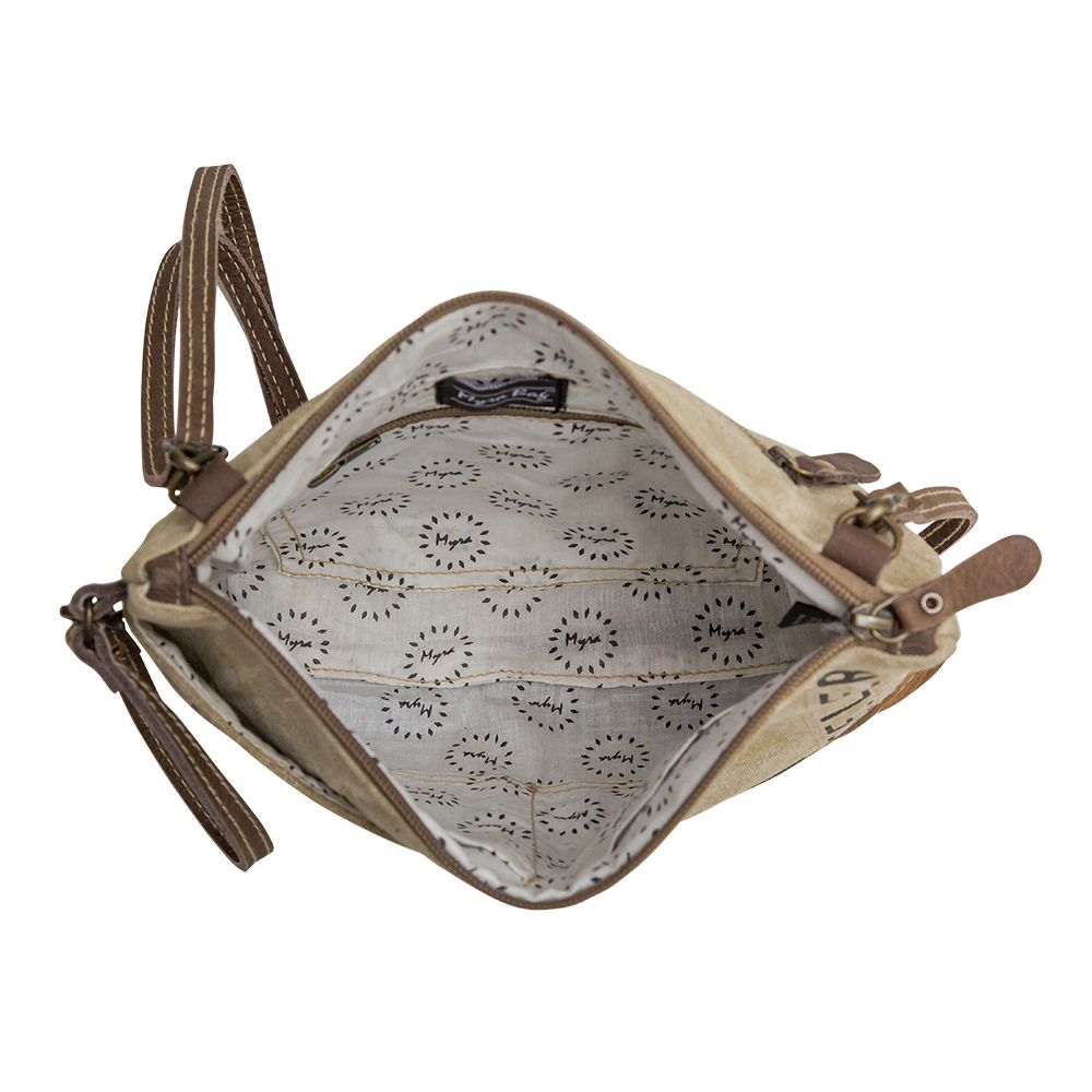 Small beige bag with floral patterned interior on a white background