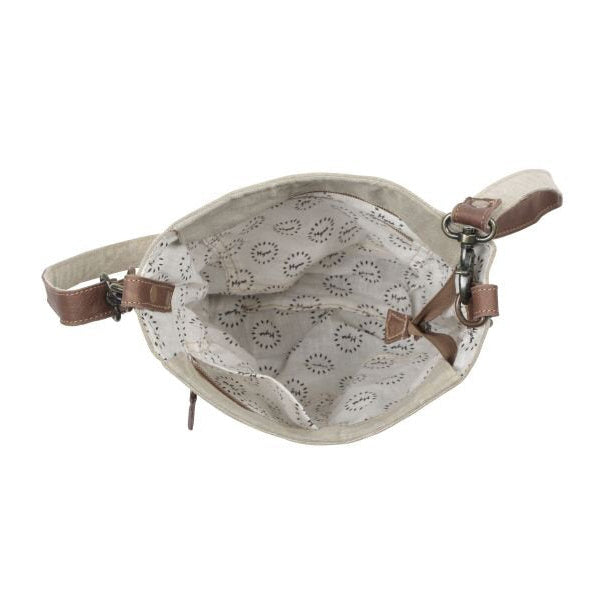 Small bag with a patterned interior on a white background