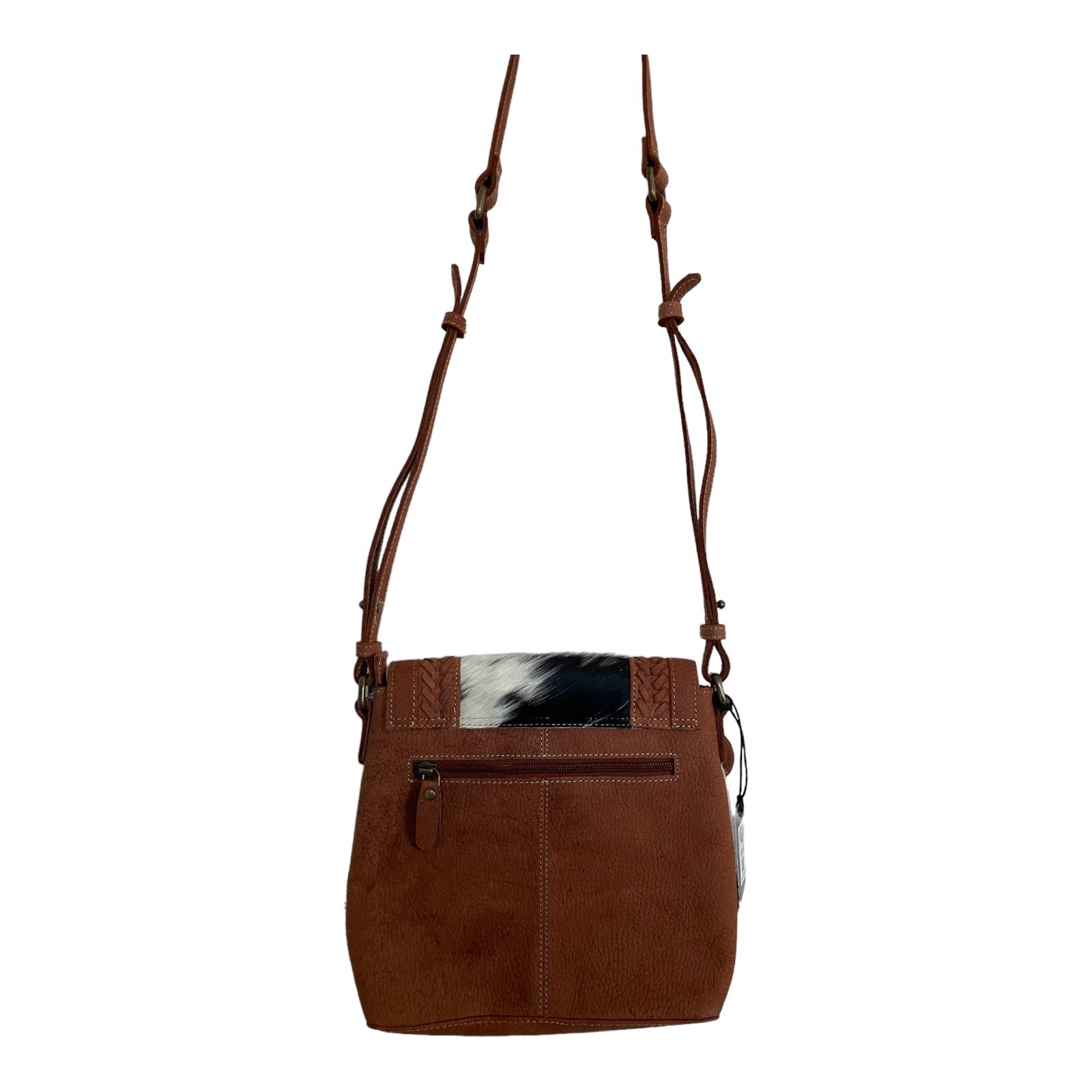 Brown leather handbag with a unique design on a white background